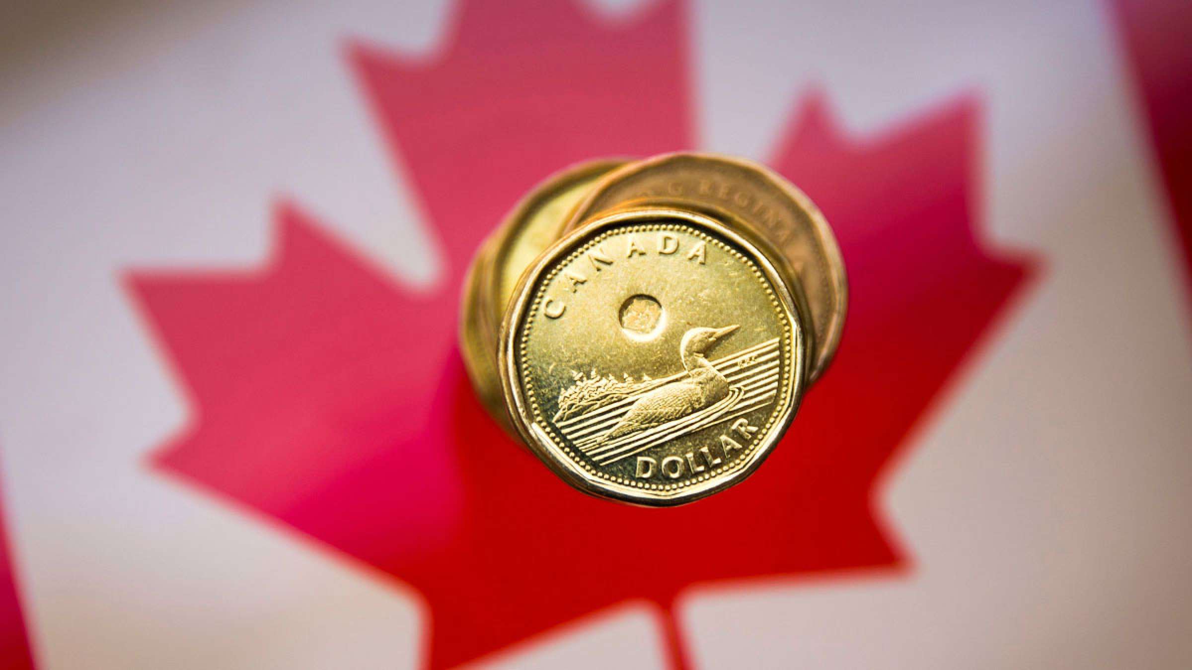 خبر-کانادا-اقتصاد-کجا-افت-ارزش-دلار-معاملات-املاک-اخراج-کارمندان-بانک